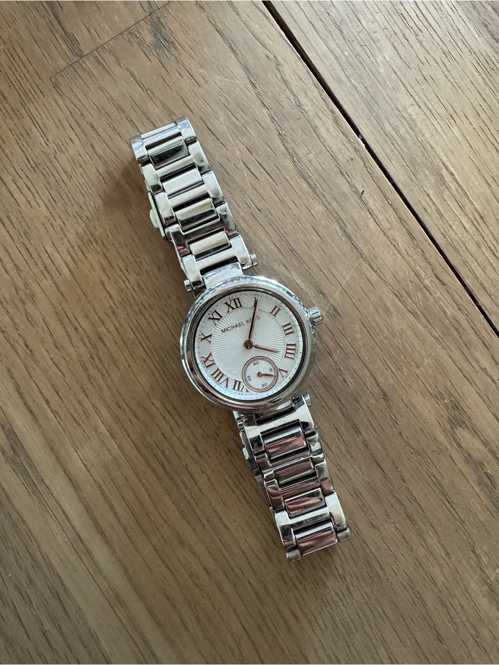 Michael Kors Silver Watch with White Dial and Roman Numerals